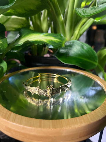 Gold bat bangle